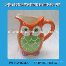 Handmade ceramic water jug with owl design